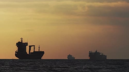 Timelapse Magnificent Sunset or Sunrise at Sea with Steamships Standing on the Horizon Timelapse Dry