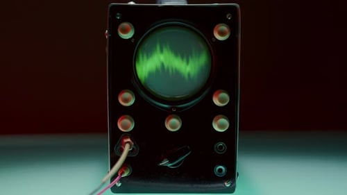Close-Up of Oscilloscope Showing Waveform Signal with Jagged Pattern