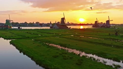 Aerial View of Windmills at Famous Tourist Site Zaanse Schans in Holland on Sunset Zaandam