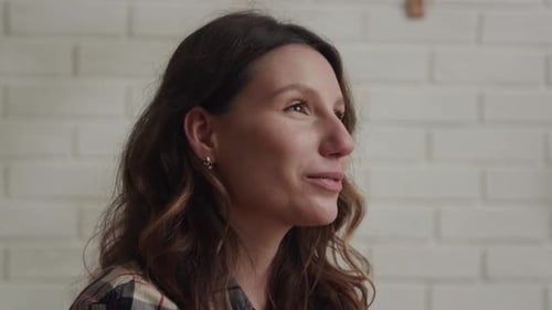 Woman Smiling and Talking in a Close Up Portrait