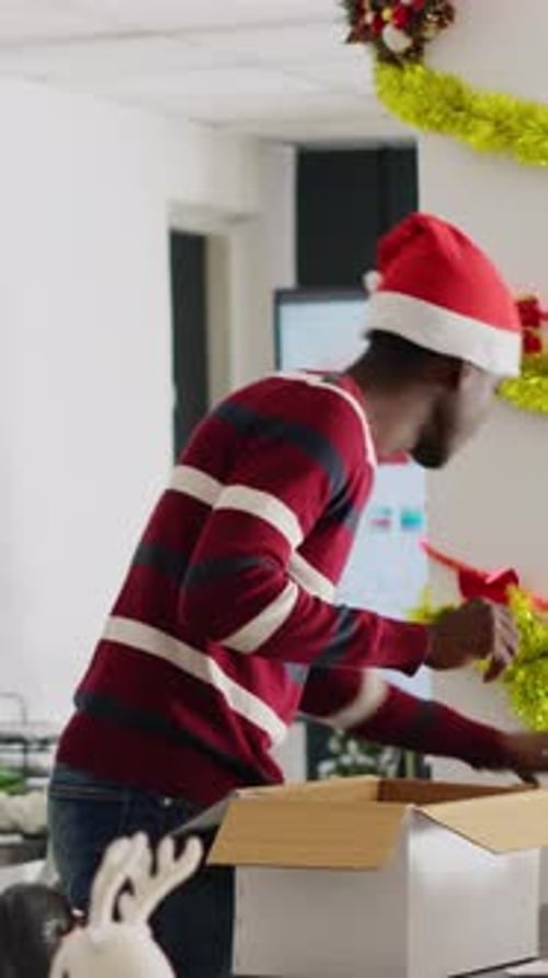 Vertical Video Worker Clears Desk Leaves for Holiday