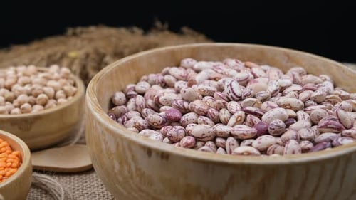 Pinto Beans and Legumes in Wooden Bowls