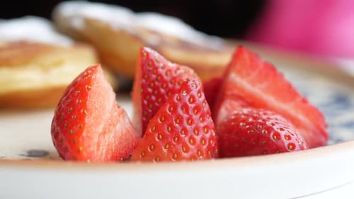 Ripe Red Strawberries in a Bowl on Table