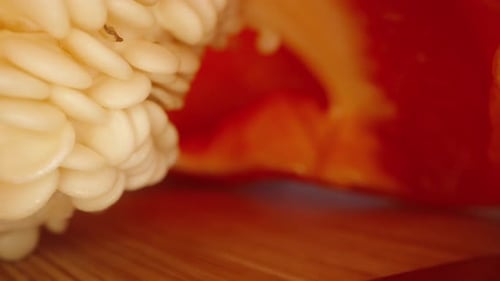 Fresh Red Bell Pepper Sliced on Cutting Board