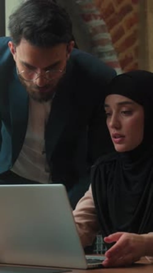 Indian Business Team in Office Businesswoman Intern Working Laptop Software Error Puzzled Arabian