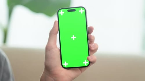 Showing Chroma Key Green Screen Phone at Home Advertising Apps Games or Online Shops