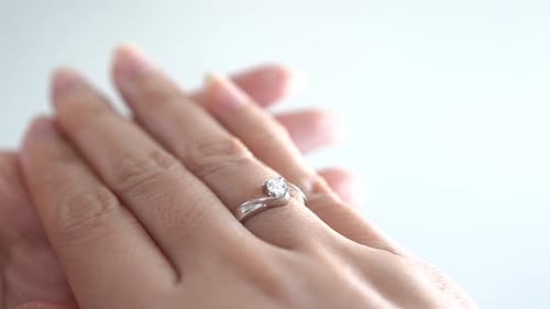Close up woman hand wearing a ring