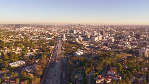 Aerial view of highway & cityscape, United States.