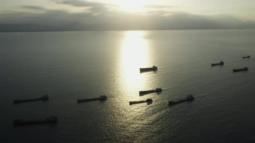 Busy maritime cargo shipping lane as seen from the sky