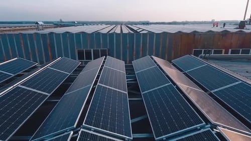 Solar Panels on Rooftop in Industrial Area
