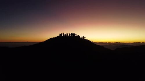 Aerial video of Mount Pulag at sunset with people in the background, the third highest mountain