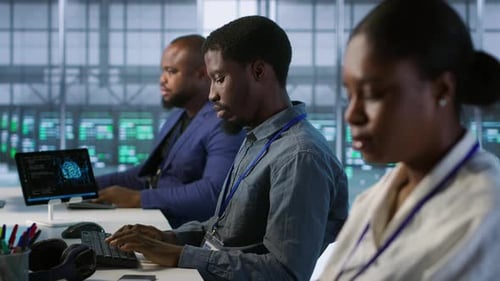 System Administrators in Data Center Implementing AI Predictive Systems