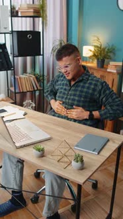 Indian Man Feeling Sudden Strong Abdominal Stomach Ache Gastritis Problem Diarrhea at Home Office