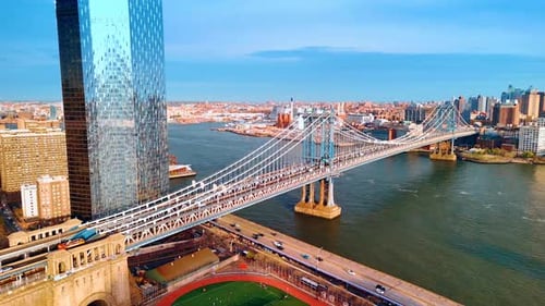 Baseball field located under the Manhattan Bridge. Stunning New York scenery in the light of sunset.