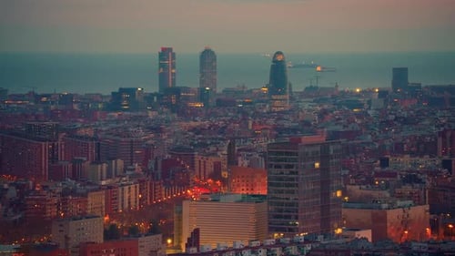 Establishing Shot of Barcelona Skyline From West to East Barcelona City Streets Illuminated and