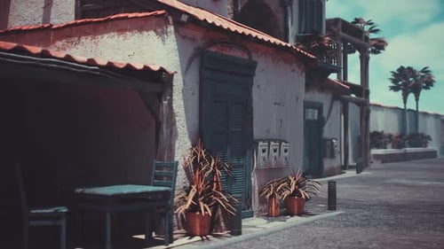 Vintage Scene with Pottery Sundrenched Pottery Shop with Shaded Porch