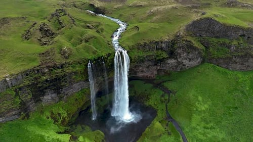 Majestic Seljalandsfoss Waterfall Cascading in the Lush Landscape of Iceland