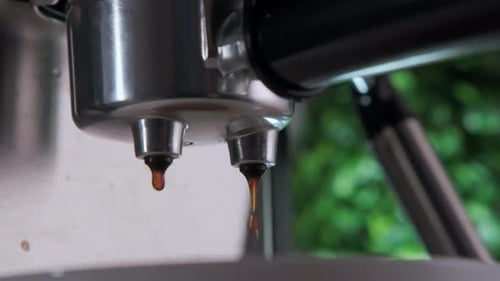 Close Up Footage of Making Coffee By Coffee Machine Into Cup Espresso Coffee