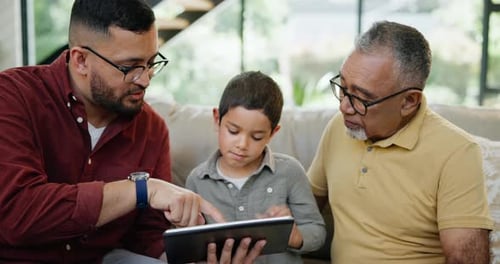 Three Generations of Family Using Tablet Together