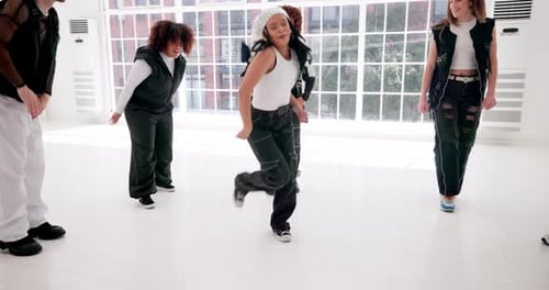 Breakdance, hip hop and windmill with people in studio for choreography