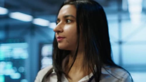 Woman Using Tablet Device in Modern Workplace