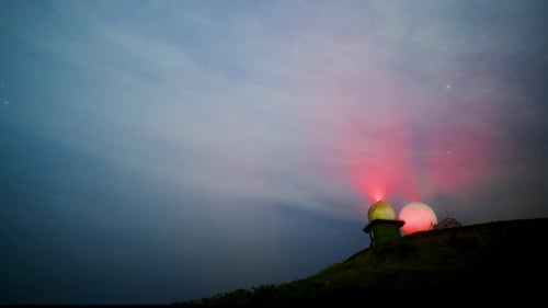 Gazing upon the Night Sky from the Summit. The radome glows mesmerizingly.