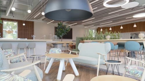 Slow dolly shot of furniture sitting within an empty office lobby