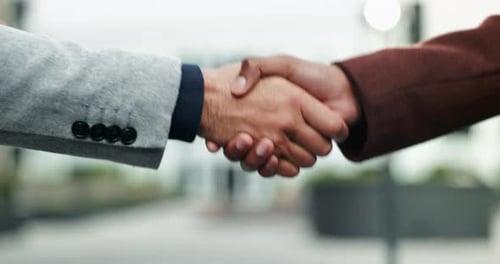 Professional, people and closeup with handshake in city for introduction, welcome or greeting