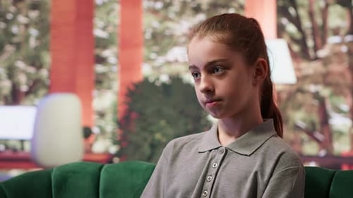 Girl Talking on a Couch