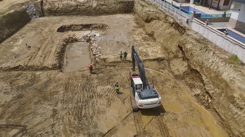 Aerial View Foundation Work Pouring First Concrete and Operating Machinery