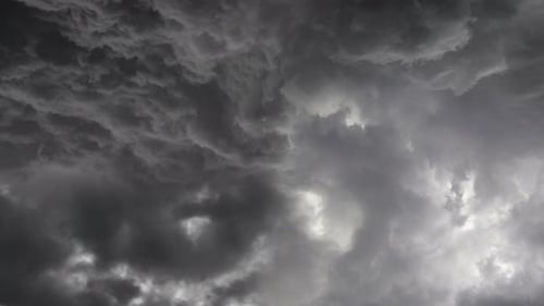 view of lightning storm and dark clouds in the sky.