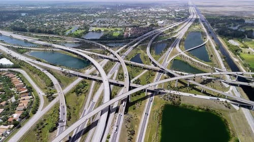 A Raised Highway Interchange in Miami Bustling with the Fast Moving Vehicles Showcasing US