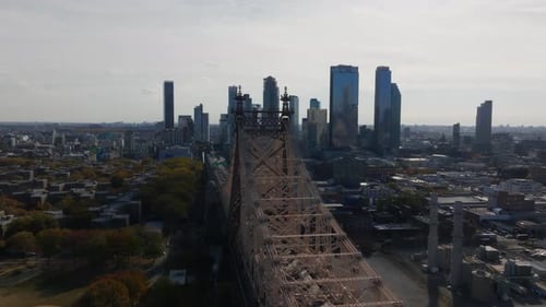 Aerial View Moving Forward Over Queensboro Bridge and Low Residential Buildings of Queens Borough