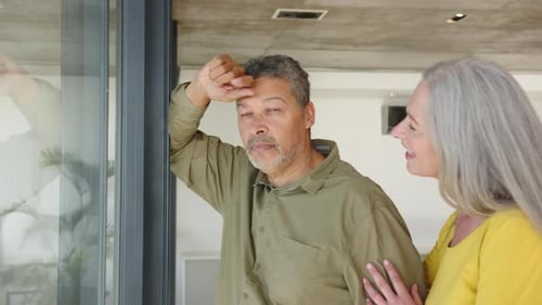 Mature Couple Smiling Together at Home