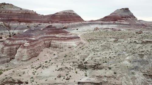 Aerial View on Strange Out Of This World Layered Rock Formations an Hills in Utah Desert, USA