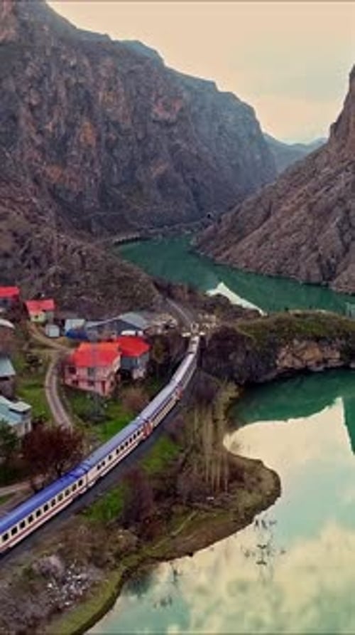 Train Journey through Mountain Canyon River Valley