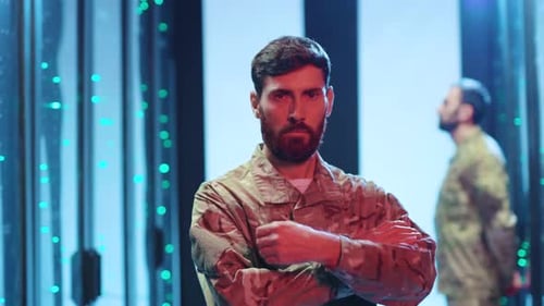 Man in Military Uniform Standing in Data Center