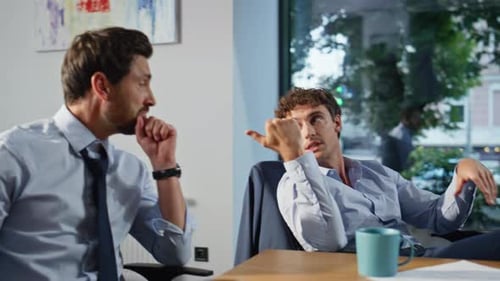 Two Startupers Having Conversation Sitting Office at Break Closeup Men Talking