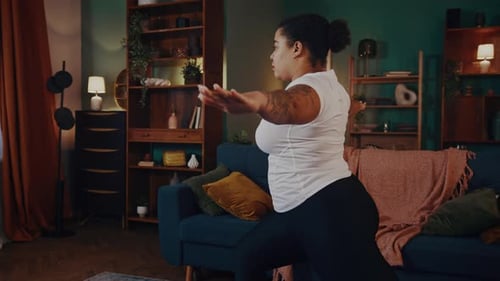 Mixed Race Woman Performs Warrior Pose Enjoying Yoga Session