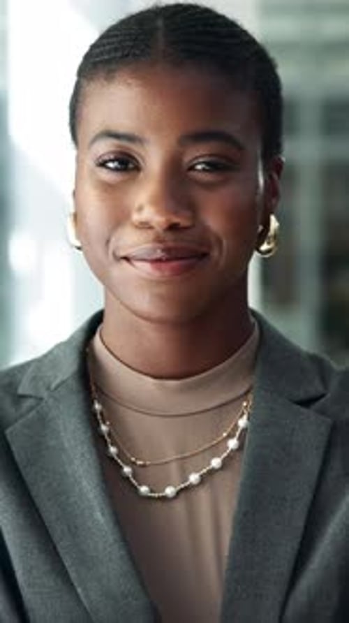 Face, business and black woman with smile in office as lawyer, legal consultant