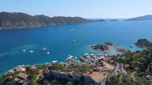 Beautiful view of the beach with boats, pure nature, sea and ships. Shot from a drone.