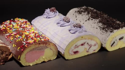 Delicious Sponge Cake Rolls with Colorful Frosting