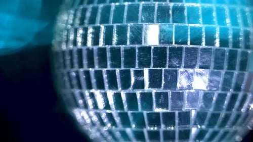 Close Up of a Shiny Disco Ball Reflecting Light
