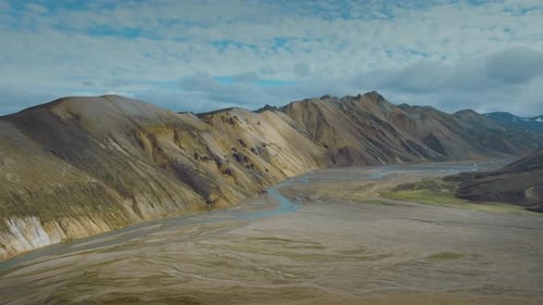 Surreal mountain scape in the picturesque Iceland. Colourful mountains and river landscape.