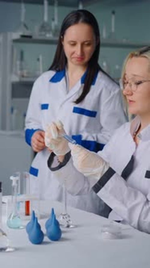 Scientists Working with Medical Sample in Science Laboratory