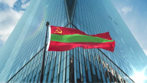 National Flag Waving In Wind With Modern Skyscraper Background