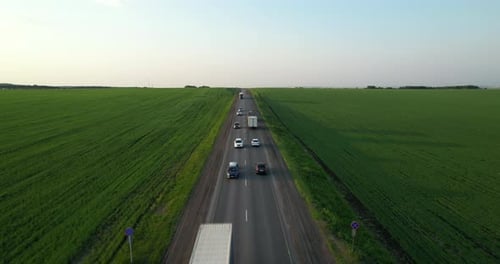 Traffic of Cars and Trucks on the Highway Aerial View