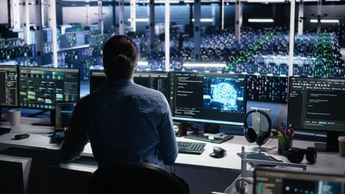 Data Center Computer Scientist Using PC to Monitor Neural Network Using AI LLM