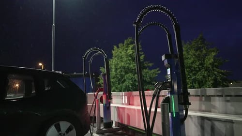 Car charging at an EV charging station