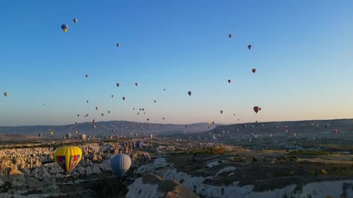 Aerial View of Hot Air Balloons at Sunrise